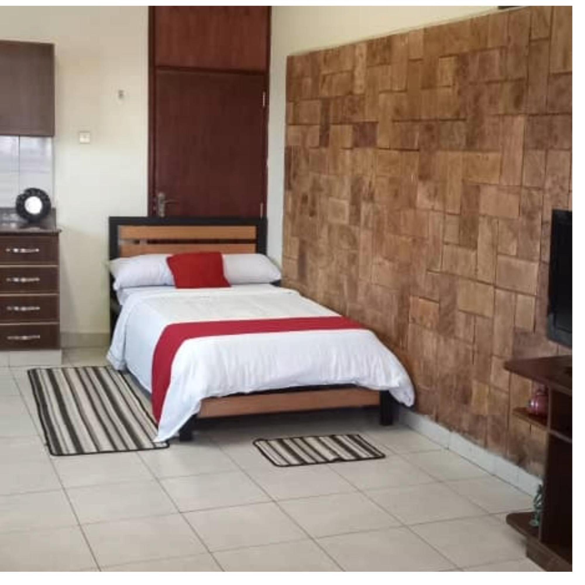 The Abode Apartments Lake View & Breakfast Suite Near Beach Энтеббе Экстерьер фото