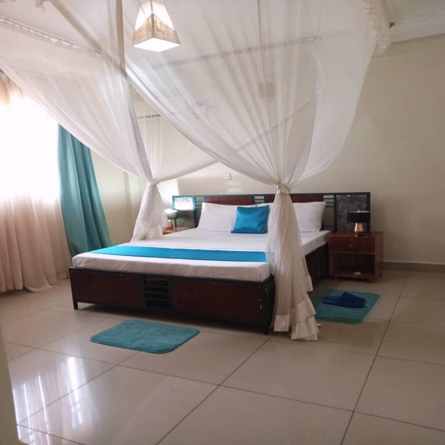 The Abode Apartments Lake View & Breakfast Suite Near Beach Энтеббе Экстерьер фото